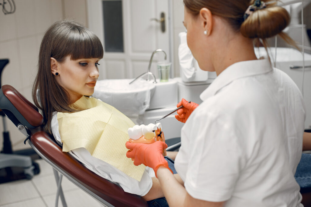Young woman at the dentist's reception